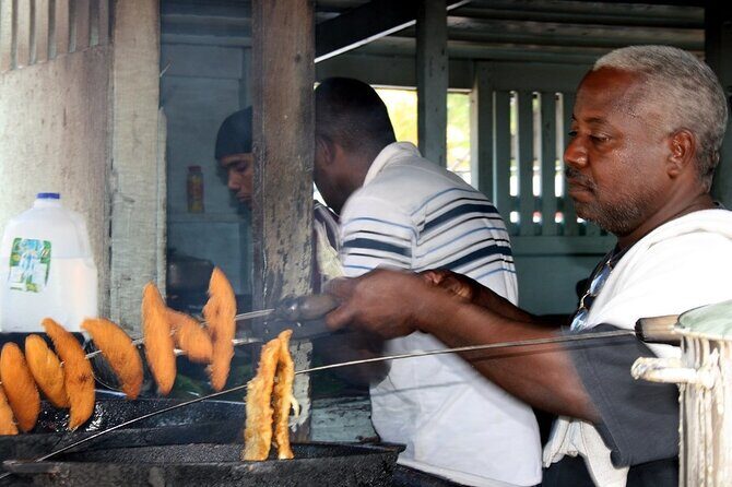 Boriken Flavor: Roast Pork Hwy, Rum Tasting, Loiza Fritters - Los Pinones kiosks: the real cooking lesson, not a show-and-tell