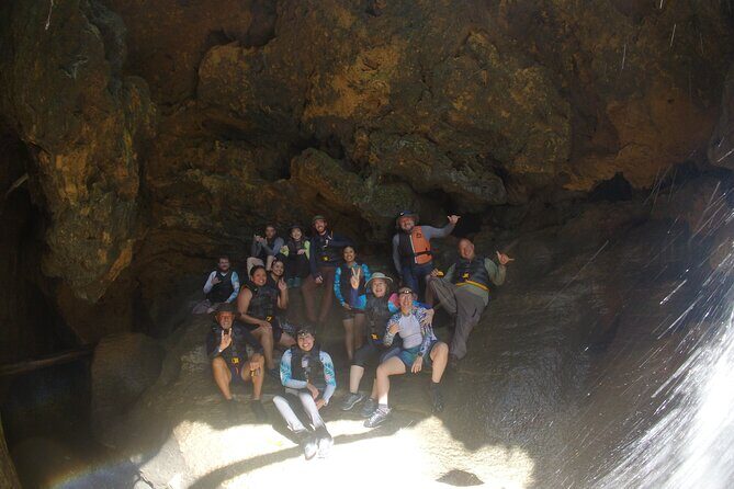 Cave Adventure - Charco Azul Caves, Canyon & Waterfall Adventure - Arenales Caves swim: underground rivers feel totally different