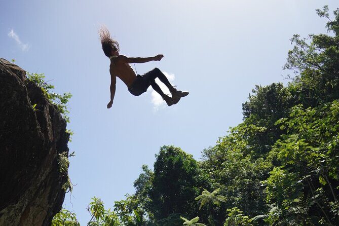 Famous Natural Waterslide in El Yunque Rainforest - Rope swing and cliff jumps: how to get the most thrills safely