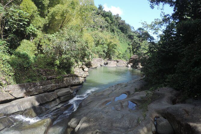 Half-Day Tour: El Yunque, Waterslides, and Luquillo Beach - Luquillo Beach: swim, kiosks, and local food on your own