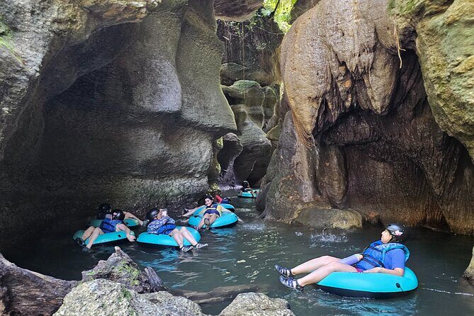 Rainforest Cave Tubing Adventure - The full 4-hour flow: hike in, tube through caves, cool off under waterfalls