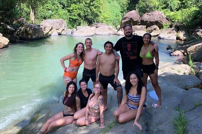 Rainforest Waterfall Slides/Adult Drinks included/ Beach - The mini rock cave photo stop