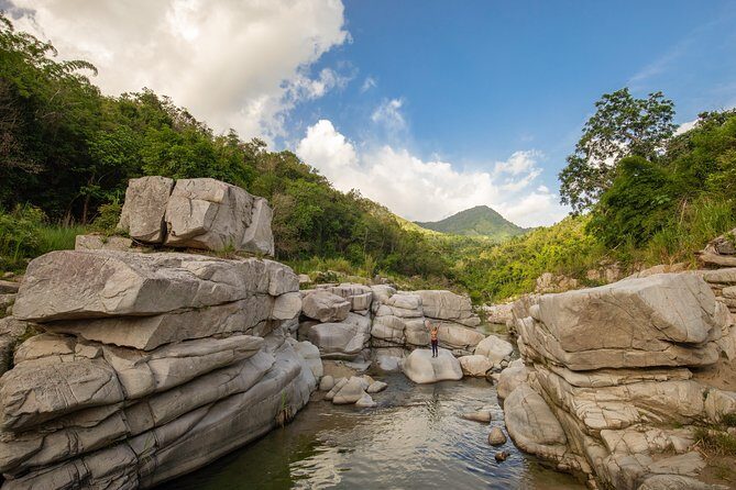 Utuado Canyon, River & Waterfall Adventure in Puerto Rico - Giant volcanic rock cliffs and a river-carved canyon you can read with your feet